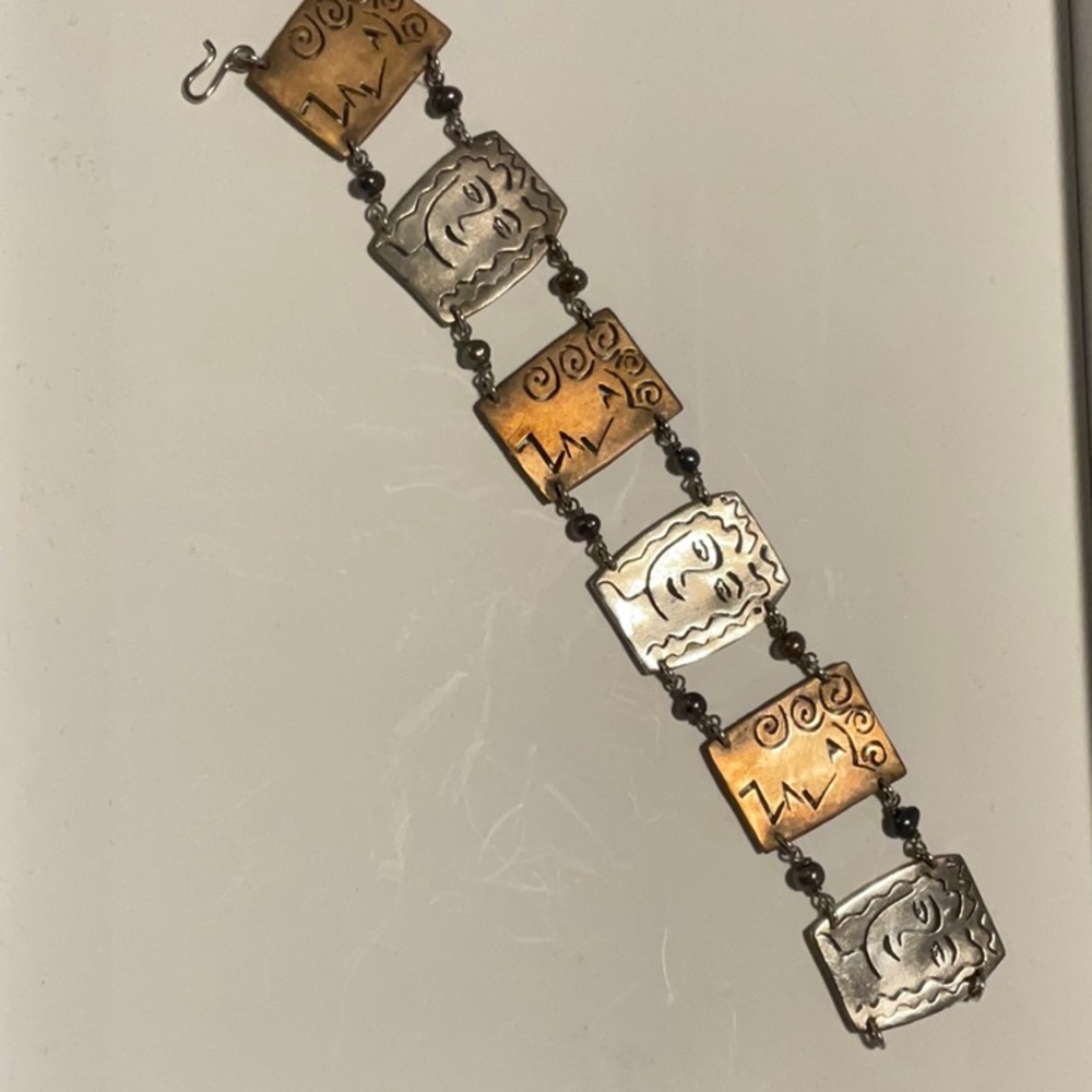 Vintage Silver and copper tone face bracelet, 7”